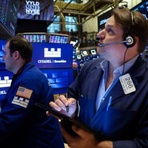 Dow, S&P end flat, Nasdaq snaps four-week decline on tariff hopes